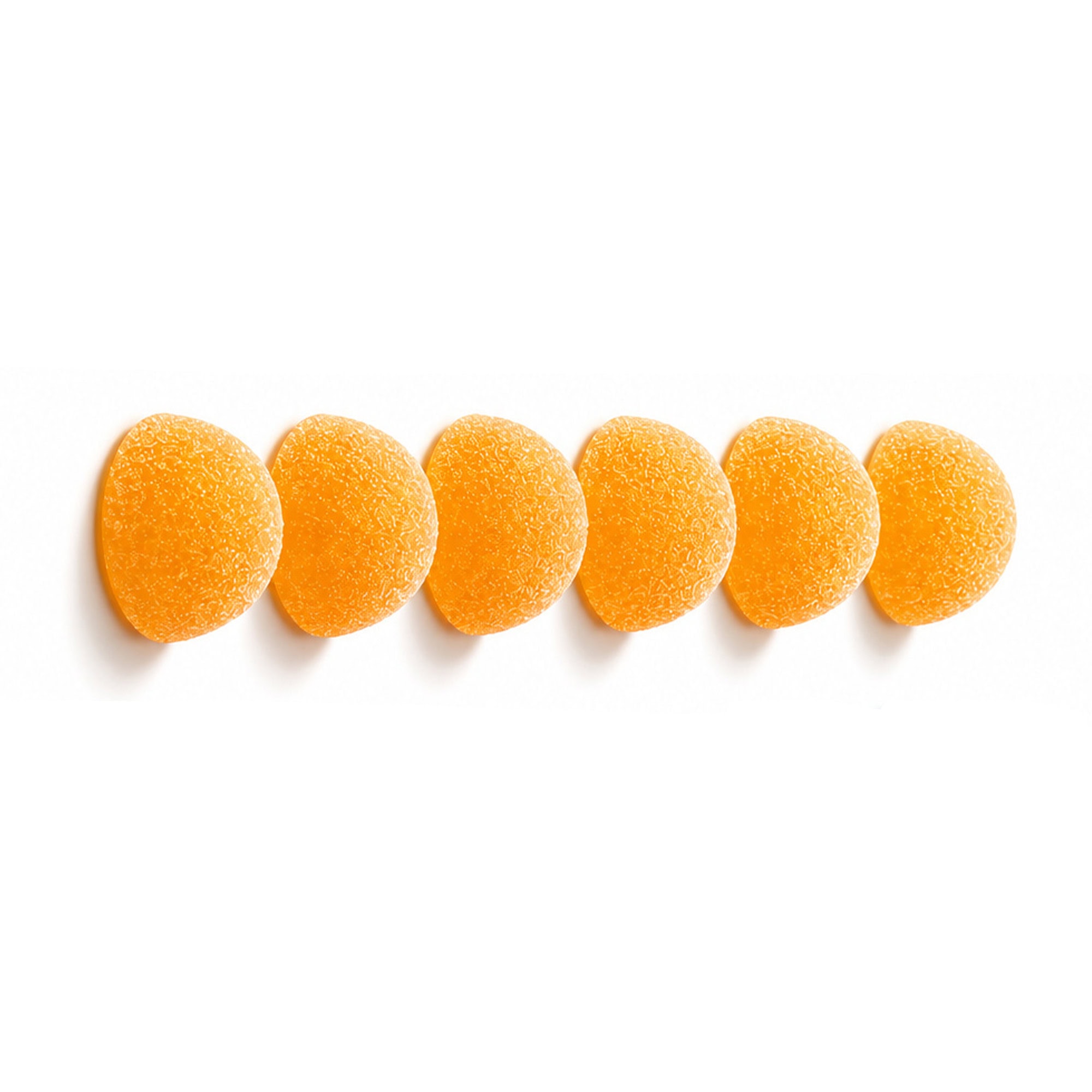 Row of orange peach flavored hemp gummies
