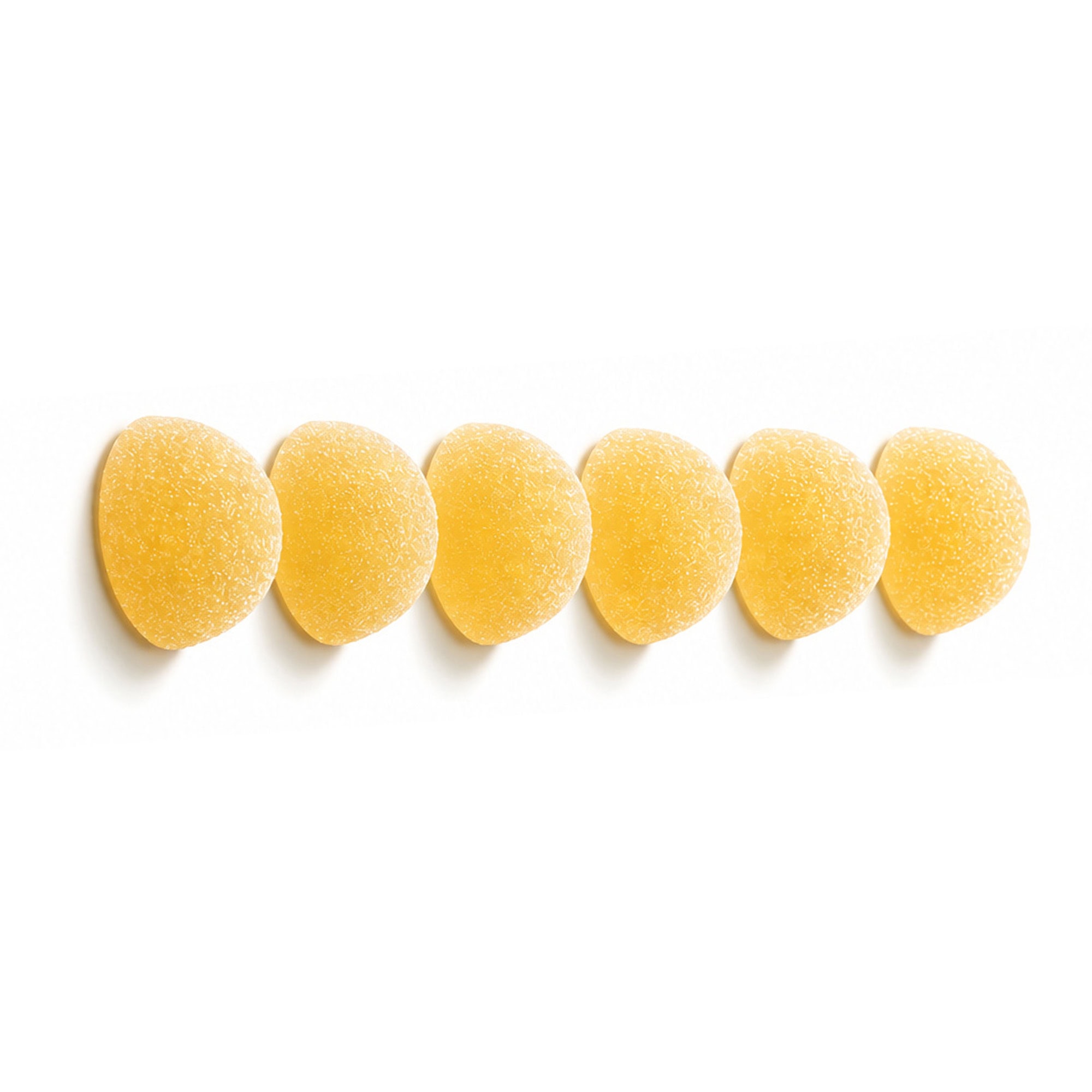 Row of yellow pineapple flavored hemp gummies